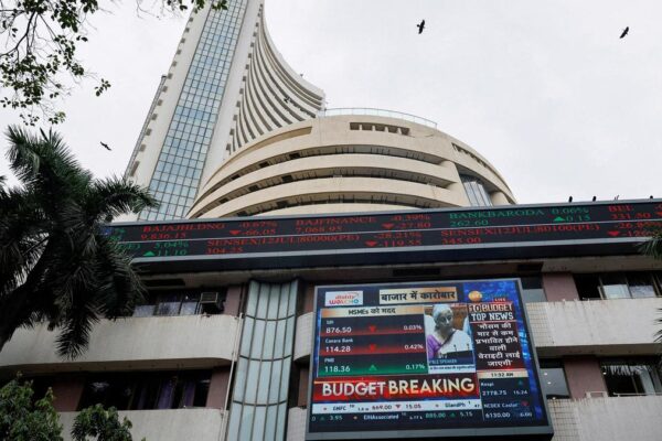 Sensex, Nifty end flat on trade war worries